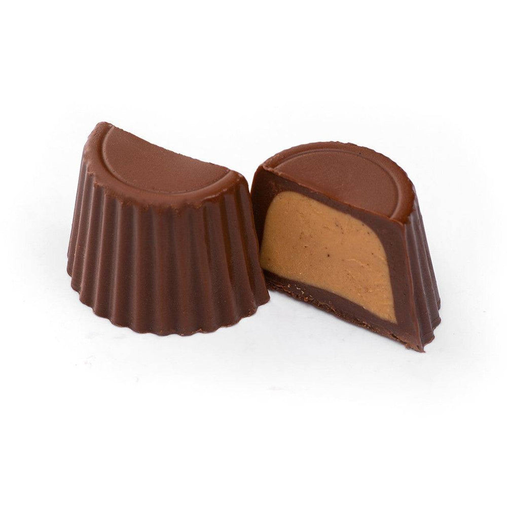 GRASSHOPPERS Cannabis Cup - Peanut Butter Cannabis | 10mg| San Dimas. A rich chocolate peanut butter cup with a creamy filling, perfect for discreet relaxation.