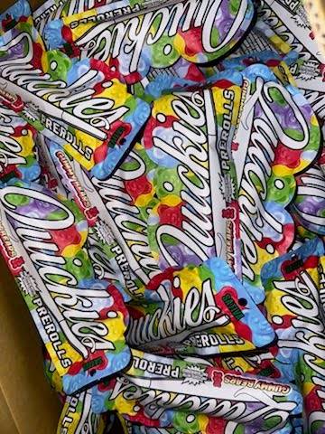Quickies 1g Flavors Preroll infused with Sativa Gummy Bears, featuring colorful packaging with vibrant designs in La Habra.